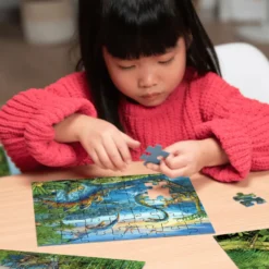 Pussel med 3 x 49 bitar – Dinosaurier