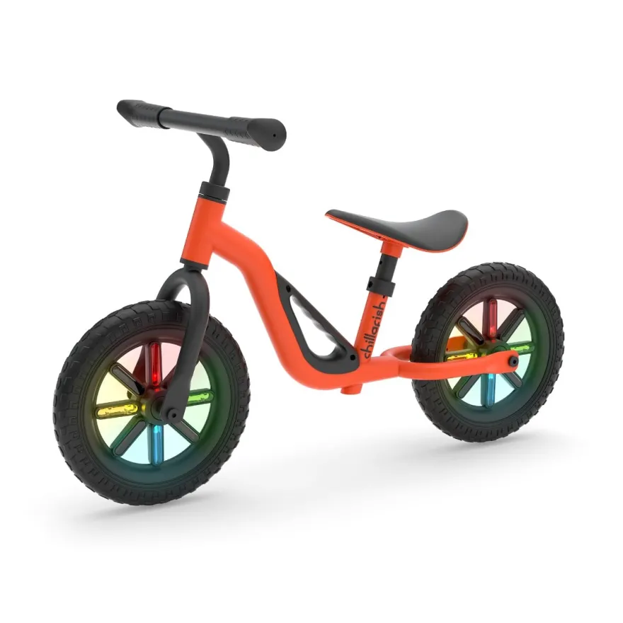 Springcykel Charlie GLOW – Orange (18 mån–4 år)