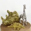 Stegosaurus av papier maché - L: 21,9 cm
